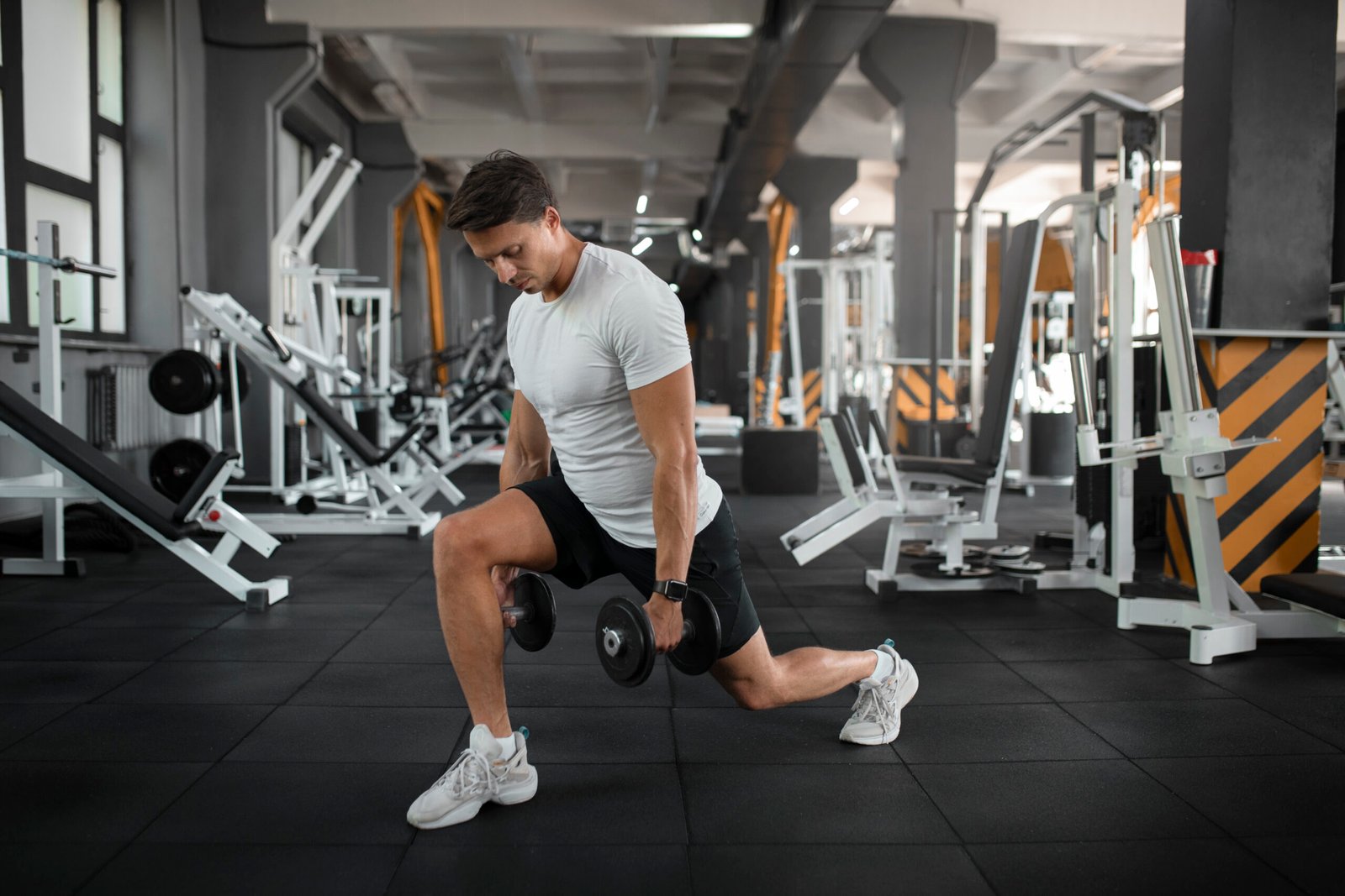 woman-helping-man-gym